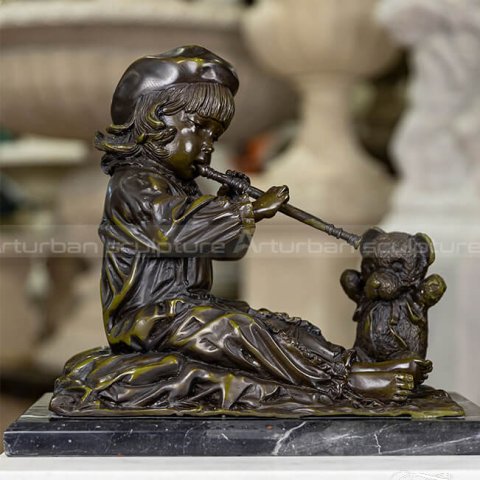 girl and dog sculpture
