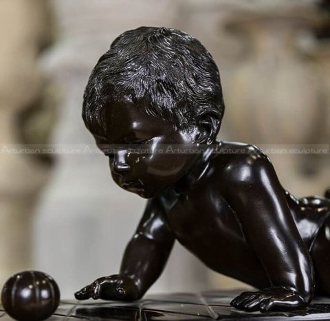 bronze baby statue