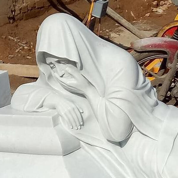 virgin mary statue weeping