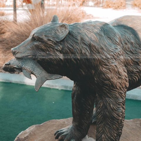 bear with fish statue