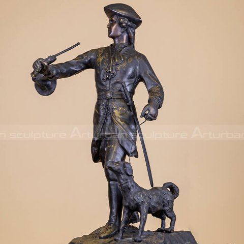 hunter and dog statue