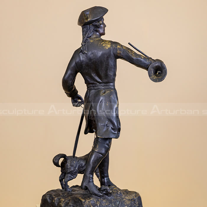 hunter and dog statue