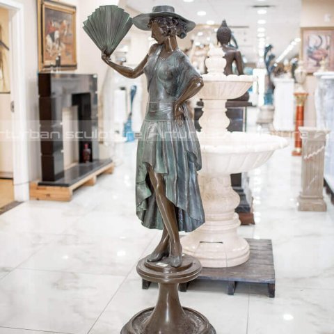 lady with fan statue