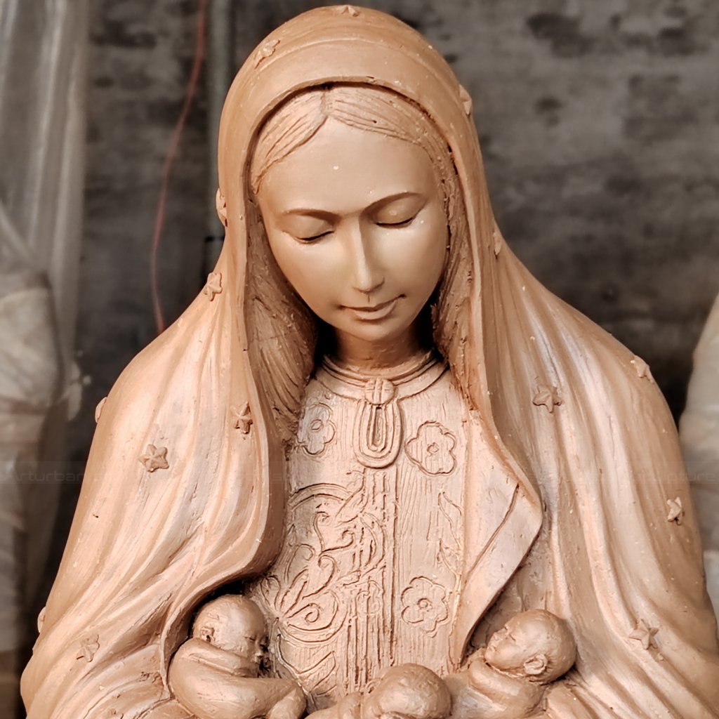 mary with child statue clay mold