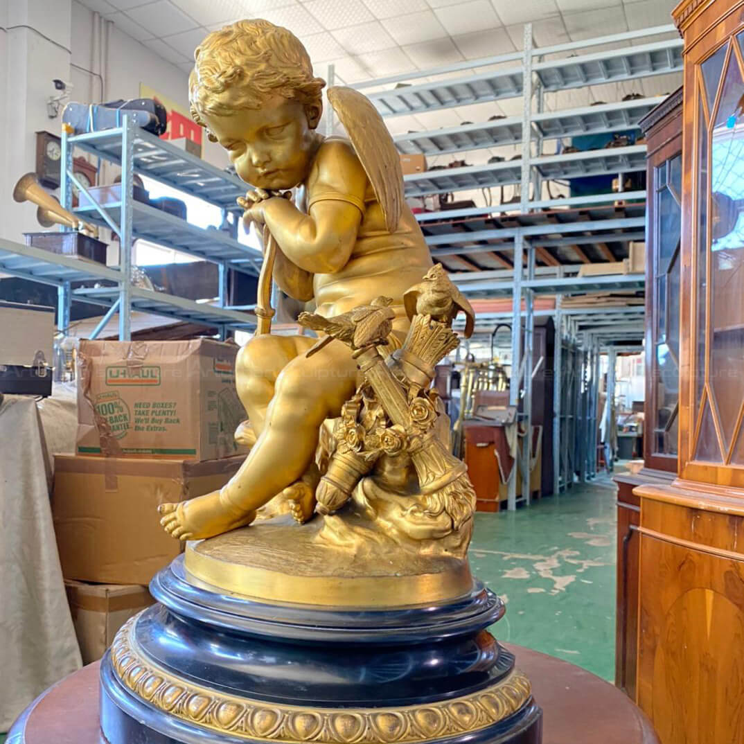 Gold Cupid Statue