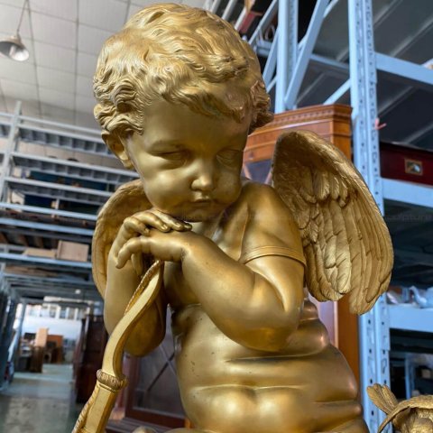 Gold Cupid Statue