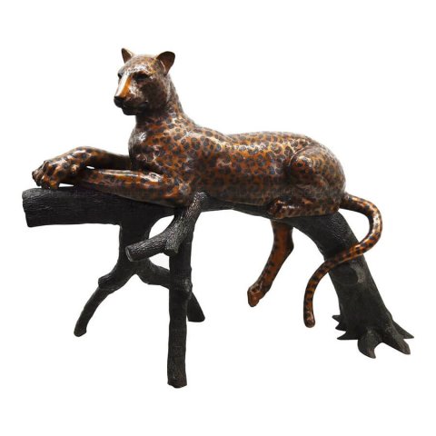 leopard on tree sculpture