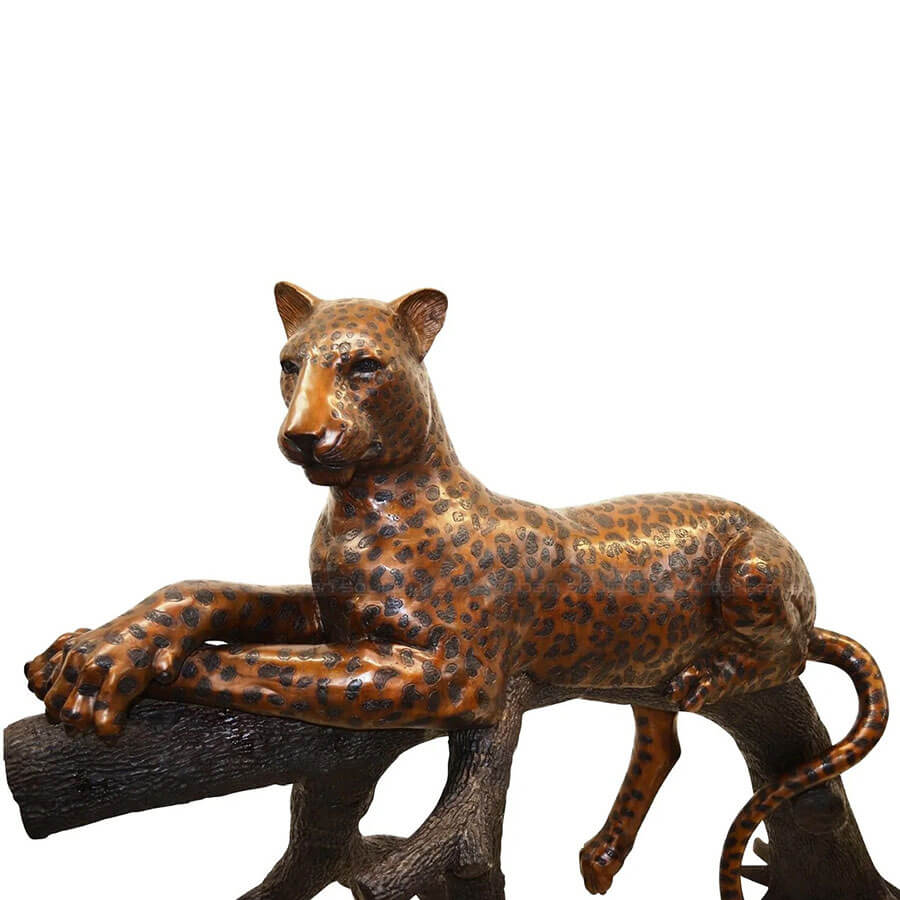 leopard on tree sculpture