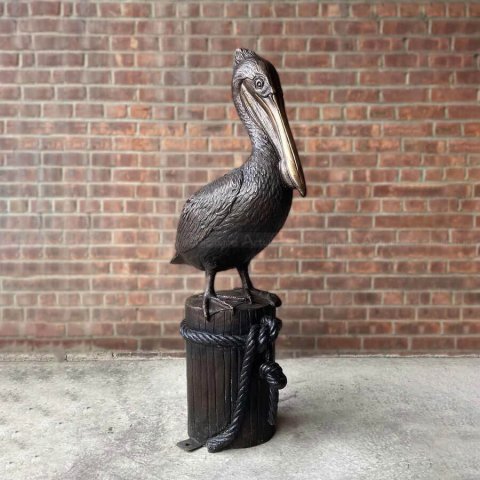 Carved Pelican Statue