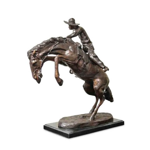 Cowboy On Bucking Horse Statue